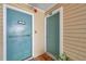Condo entryway featuring unit number 129 and a welcome mat at 1000 W Horatio St # 129, Tampa, FL 33606