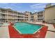 Exterior view of the community pool offering a tranquil oasis for residents to enjoy at 1000 W Horatio St # 129, Tampa, FL 33606