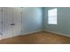 Bedroom featuring carpeted floors, and a double-door closet at 1137 Pristine Pl, Lutz, FL 33549