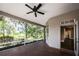 Screened porch with a view of the backyard at 1137 Pristine Pl, Lutz, FL 33549