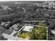 Black and white aerial view of the home at 116 Hermes Rd Venice, FL 34293 with a metal roof at 116 Hermes Rd, Venice, FL 34293