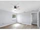 Bedroom with hardwood floors, ceiling fan, closet and bright light from the window at 116 Hermes Rd, Venice, FL 34293