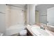 Bathroom with a shower-tub, a granite countertop, and a white porcelain sink at 12117 Streambed Dr, Riverview, FL 33579