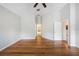 Spacious main bedroom boasts wood floors and an ensuite bathroom at 12117 Streambed Dr, Riverview, FL 33579
