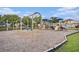 Community playground with swings, slides, and climbing structures for Gathering fun and recreation at 12117 Streambed Dr, Riverview, FL 33579