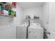 Functional laundry area with a washer and dryer at 17071 Oval Rum Dr, Wimauma, FL 33598