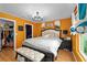 Comfortable main bedroom with ample natural light, closet, and tasteful decor at 17071 Oval Rum Dr, Wimauma, FL 33598