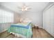 Cozy bedroom with a comfortable bed, neutral color scheme, and plenty of natural light at 2567 Frisco Dr, Clearwater, FL 33761