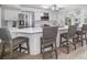 Well-lit kitchen with a center island, modern appliances, and sleek countertops at 2567 Frisco Dr, Clearwater, FL 33761