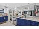 Beautiful kitchen featuring granite countertops, stainless steel appliances, open concept to living area at 2591 Countryside Blvd # 5304, Clearwater, FL 33761