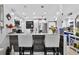 Eat-in kitchen with breakfast bar, stainless steel appliances and updated white cabinets at 2591 Countryside Blvd # 5304, Clearwater, FL 33761