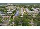 A beautiful view of the community nestled amidst lush trees and a serene waterfront at 358 Moorings Cove Dr # 4B, Tarpon Springs, FL 34689