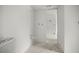 Unfinished bathroom featuring plumbing and access to additional rooms at 358 Moorings Cove Dr # 4B, Tarpon Springs, FL 34689