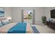This staged bedroom features a waterfront view with a boat parked out front and minimalist decor at 358 Moorings Cove Dr # 4B, Tarpon Springs, FL 34689