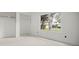 Bright bedroom featuring closet space, and a large window with an outside view at 358 Moorings Cove Dr # 4B, Tarpon Springs, FL 34689