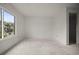 Bright bedroom with a large window and a waterfront view at 358 Moorings Cove Dr # 4B, Tarpon Springs, FL 34689