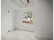 Unstaged room with a view of the neighborhood at 358 Moorings Cove Dr # 4B, Tarpon Springs, FL 34689