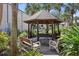 Community gazebo with benches and landscaping at 358 Moorings Cove Dr # 4B, Tarpon Springs, FL 34689