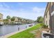 Waterfront view with docks lining the waterway at 358 Moorings Cove Dr # 4B, Tarpon Springs, FL 34689