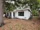 A single-story home with a white exterior at 4050 Iris N St, St Petersburg, FL 33703
