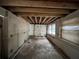 Open interior space showing exposed wooden ceiling beams at 4050 Iris N St, St Petersburg, FL 33703