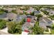 Overhead angle of property displaying solar panels and surroundings in a residential area at 5955 Caldera Ridge Dr, Lithia, FL 33547