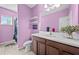 This charming bathroom has a single sink and decorative shelves at 5955 Caldera Ridge Dr, Lithia, FL 33547