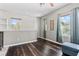 Bonus room with hardwood floors and bright windows for natural sunlight at 5955 Caldera Ridge Dr, Lithia, FL 33547