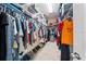 Organized walk-in closet with shelving and hanging storage for clothes and accessories at 5955 Caldera Ridge Dr, Lithia, FL 33547