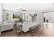 Inviting living room featuring hardwood floors, staircase and comfortable seating for relaxation and entertainment at 5955 Caldera Ridge Dr, Lithia, FL 33547