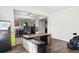 Bright office area with modern desk setup, open to a dining room, creating a versatile and functional workspace at 5955 Caldera Ridge Dr, Lithia, FL 33547