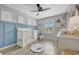 Bedroom with crib, nautical decor, and blue wainscoting at 6555 Kenava Loop, Palmetto, FL 34221