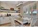 Charming dining area with a table, and window shutters at 6555 Kenava Loop, Palmetto, FL 34221
