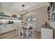 Charming dining area with a table, and window shutters at 6555 Kenava Loop, Palmetto, FL 34221