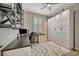Spacious home office including a built-in desk, shelving, storage, and large wardrobe at 6555 Kenava Loop, Palmetto, FL 34221