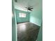 Bright bedroom with hardwood floors and a standard closet at 713 Rustic Oaks Dr, Palm Harbor, FL 34684