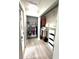 A walk-in closet with organized clothing racks, shelves, and storage baskets at 713 Rustic Oaks Dr, Palm Harbor, FL 34684