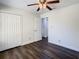 Bedroom with a closet and new flooring at 9027 Pebble Creek Dr, Tampa, FL 33647