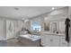 Bright bathroom featuring a soaking tub, double vanity, and large mirrors at 9456 Channing Hill Dr, Sun City Center, FL 33573