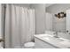 Bright bathroom with a shower, sleek countertop, and modern fixtures that provide a clean, functional design at 9456 Channing Hill Dr, Sun City Center, FL 33573