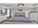 Spacious main bedroom with stylish decor, tray ceiling, and modern furnishings at 9456 Channing Hill Dr, Sun City Center, FL 33573