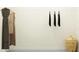 Empty closet with wire shelving, clothing, and a patterned storage basket at 10906 Rustic Eve Ct, Land O Lakes, FL 34638