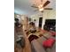 Spacious living room featuring hardwood floors, neutral walls, and stylish furnishings at 11439 Cambray Creek Loop, Riverview, FL 33579