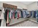 Spacious walk-in closet with ample hanging space and shelving for organized storage at 12928 Twin Bridges Dr, Riverview, FL 33579