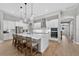 Bright modern kitchen featuring a large island, stainless steel appliances, and ample cabinet space at 12928 Twin Bridges Dr, Riverview, FL 33579