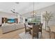 Cozy living space with views of the pool area, seamlessly blending indoor and outdoor living at 12928 Twin Bridges Dr, Riverview, FL 33579