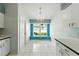 Bright breakfast nook with chandelier and a large window offering outdoor views at 1725 Bondurant Way, Brandon, FL 33511