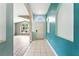 Bright foyer with tiled floor, arched doorway, and view into the living room at 1725 Bondurant Way, Brandon, FL 33511