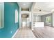 Inviting hallway leading to other rooms with views into the kitchen at 1725 Bondurant Way, Brandon, FL 33511