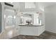Kitchen area with white cabinets, stainless steel appliances, and tile flooring at 1725 Bondurant Way, Brandon, FL 33511